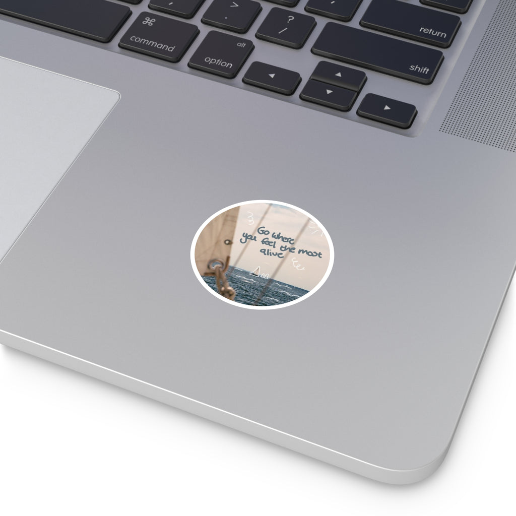Round Sticker — “Go Where You Feel the Most Alive” Sailboat Laptop Decal