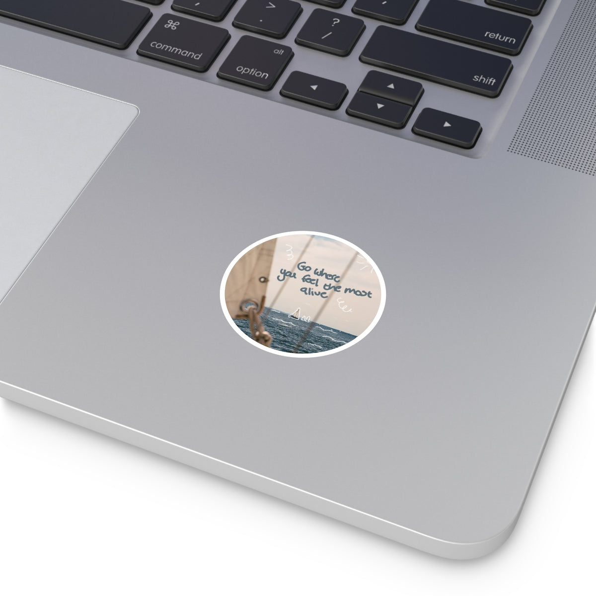 Round Sticker — “Go Where You Feel the Most Alive” Sailboat Laptop Decal
